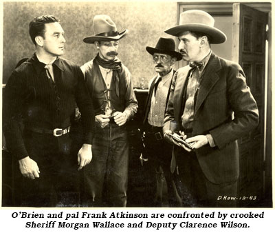 O'Brien and pal Frank Atkinson are confronted by crooked Sheriff Morgan Wallace and Deputy Clarence Wilson in "Smoke Lightning".