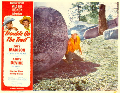 Lobby card for "Trouble on the Trail".