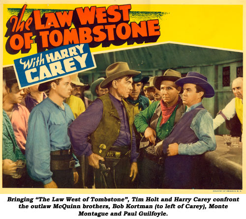 Bringing "The Law West of Tombstone", Tim Holt and Harry Carey confront the outlaw McQuinn brothers, Bob Kortman (to left of Carey), Monte Montague and Paul Guilfoyle.