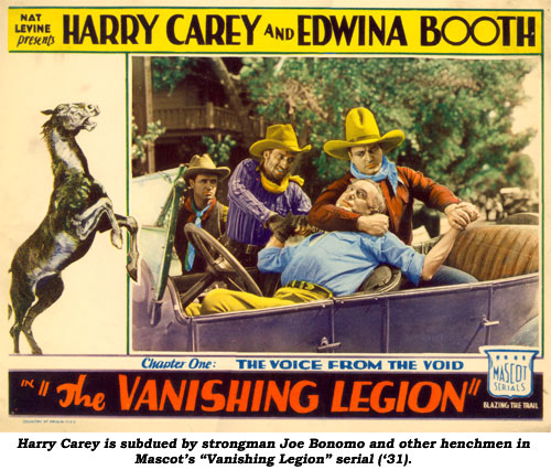 Harry Carey is subdued by strongman Joe Bonomo and other henchmen in Mascot's "Vanishing Legion" serial ('31).