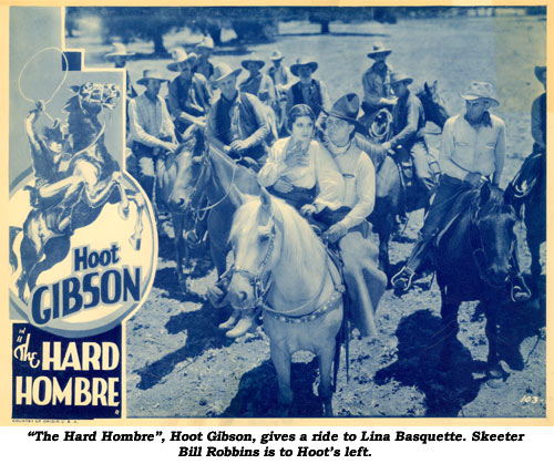"The Hard Hombre", Hoot Gibson, gives a ride to Lina Basquette. Skeeter Bill Robbins is to Hoot's left.