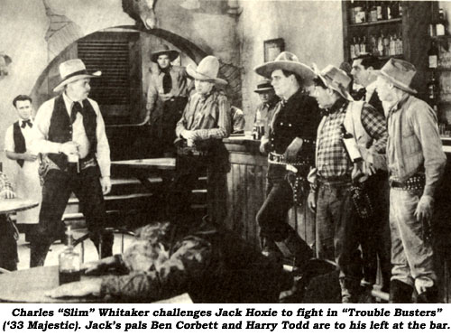 Charles "Slim" Whitaker challenges Jack Hoxie to fight in "Trouble Busters" ('33 Majestic). Jack's pals Ben Corbett and Harry Todd are to his left at the bar.