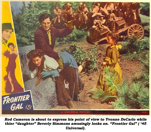 Rod Cameron is about to express his point of view to Yvonne DeCarlo (by spanking her) while their "daughter" Beverly Simmons amusingly looks on. "Frontier Gal" ('45 Universal) lobby card.