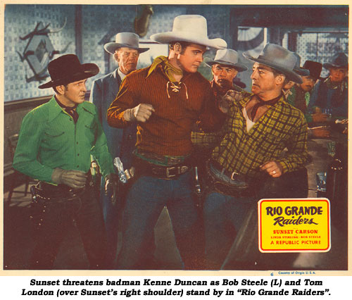 Sunset threatens badman Kenne Duncan as Bob Steele (L) and Tom London (over Sunset's right shoulder) stand by in "Rio Grande Raiders".