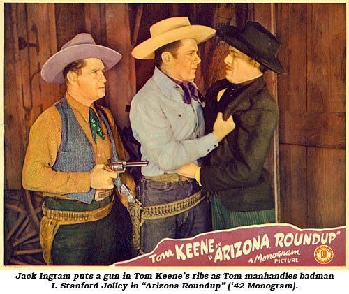 Jack Ingram puts a gun in Tom Keene's ribs as Tom manhandles badman I. Stanford Jolley in "Arizona Roundup" ('42 Monogram).