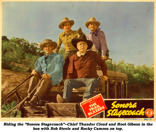 Riding the "Sonora Stagecoach"--Chief Thunder Cloud and Hoot Gibson in the box with Bob Steele and Rocky Camron on top.