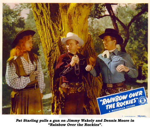 Pat Starling pulls a gun on Jimmy Wakely and Dennis Moore in "Rainbow Over the Rockies".