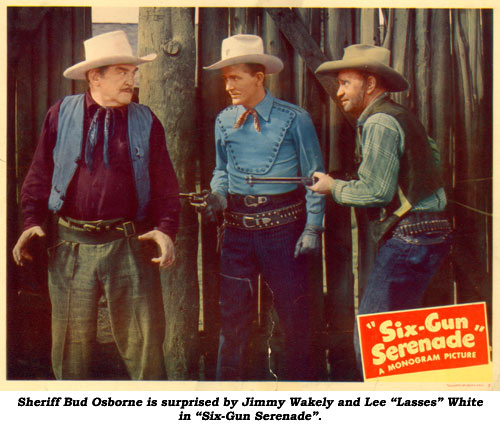 Sheriff Bud Osborne is surprised by Jimmy Wakely and Lee "Lasses" White in "Six-Gun Serenade".